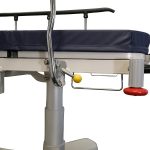 Close up image showing the yellow release latch for the side rails of the HPA480A Electric Patient Trolley