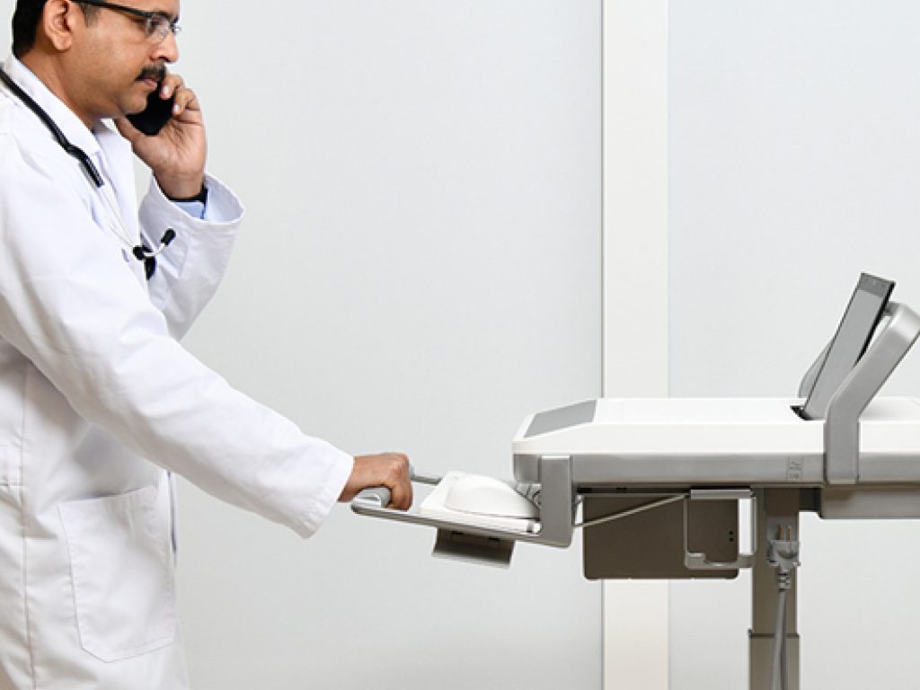 Doctor with medical cart